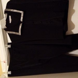 Women's 2 piece jacket and pant with elastic in the waist. Long sleeve v neck